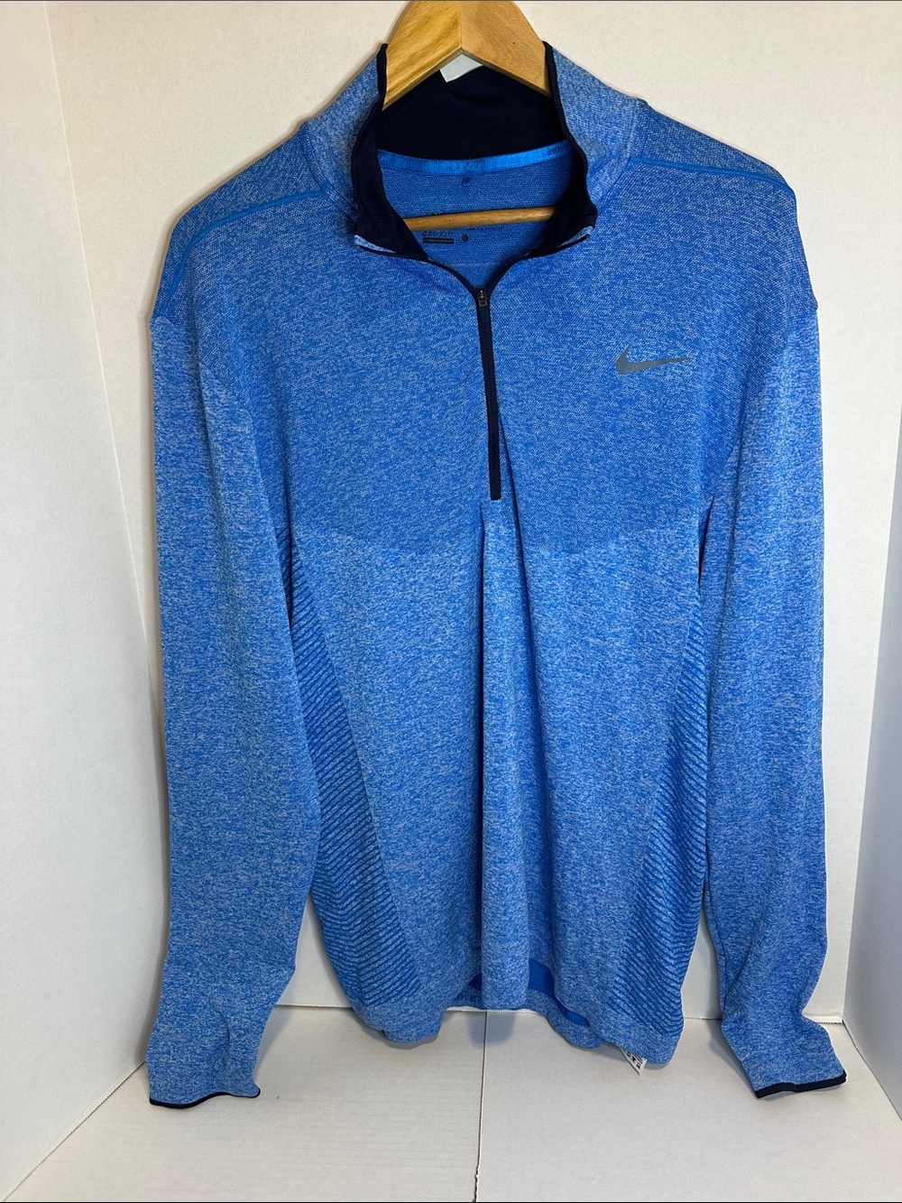 Nike Men’s Heathered Blue Half Zip Dry-Fit Golf Shirt.